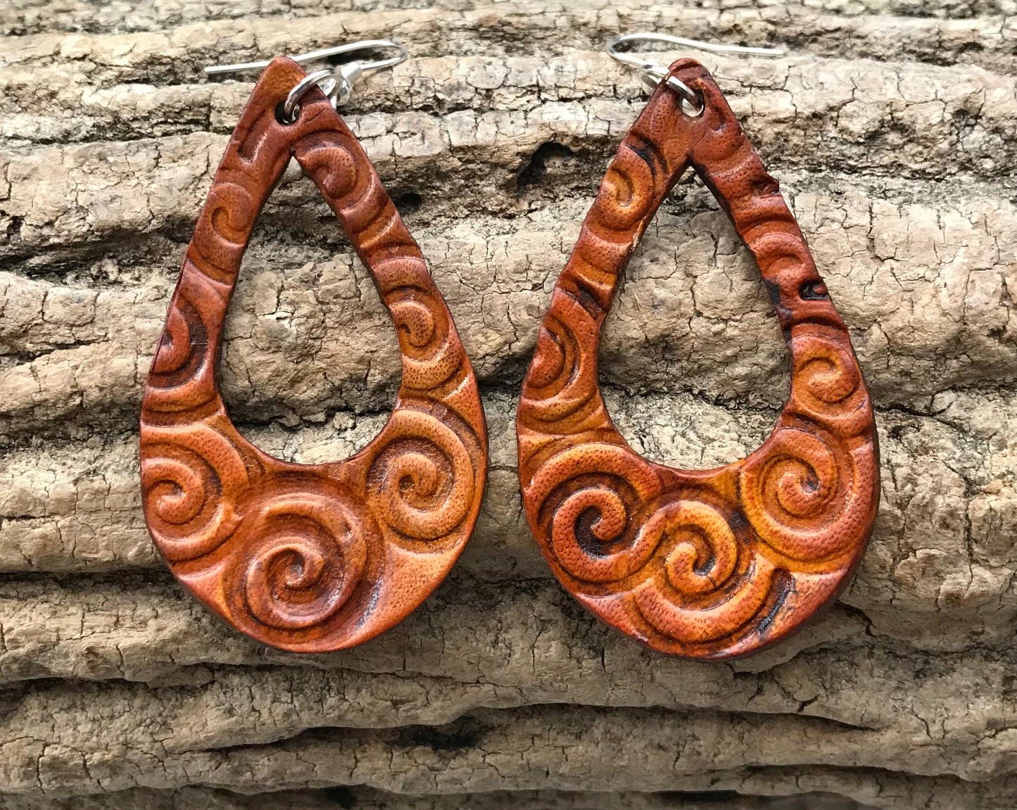 Hand tooled leather earrings, lightweight spiral earrings